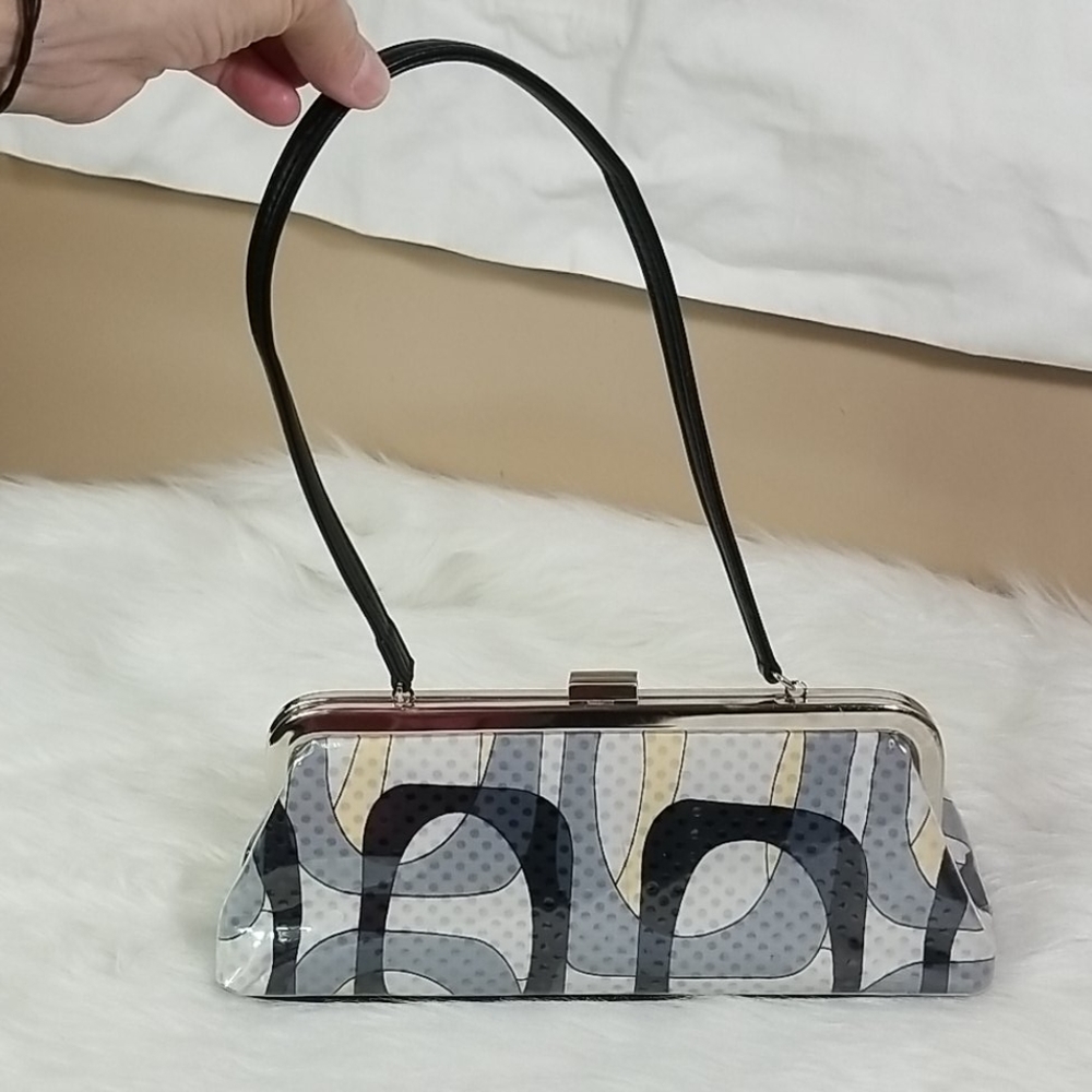 TOP HANDLE BAG WITH BLACK, GREY,AND YELLOW DESIGN